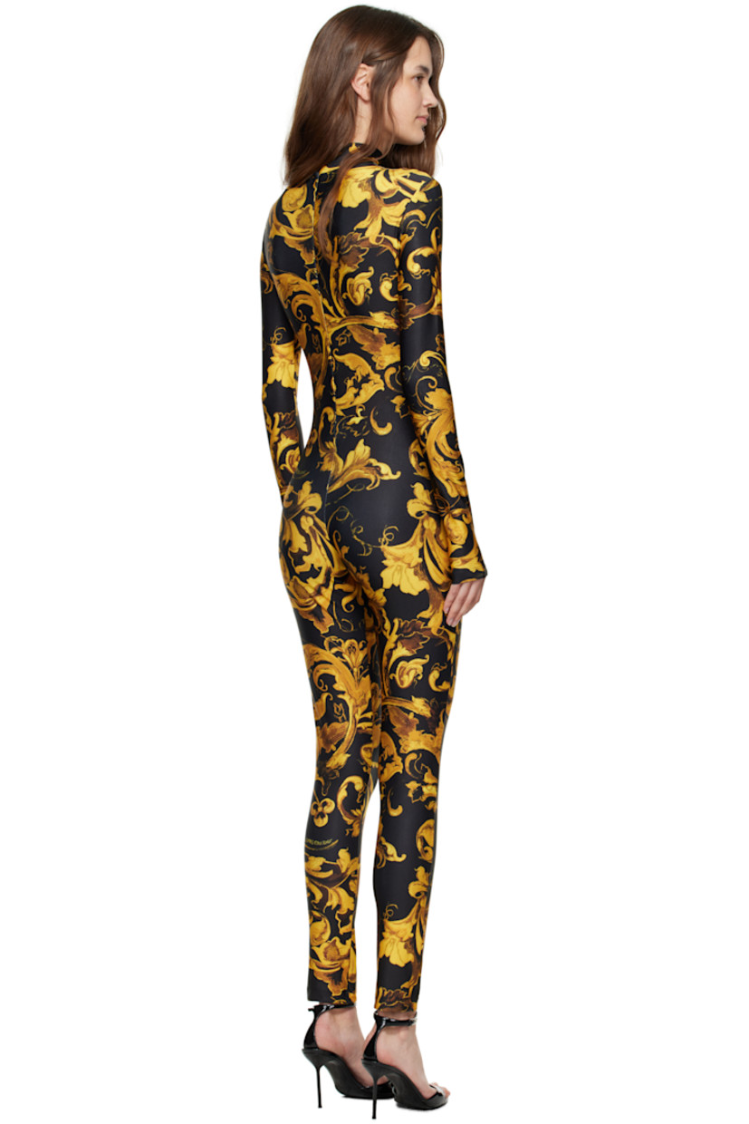 Stretch jersey jumpsuit.

· Barocco pattern printed throughout
· Stand collar
· Zip closure at back

Supplier color: Black/Gold