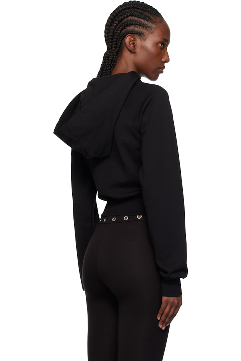 French terry hoodie.

· Logo hardware and cutout at collar
· Rib-knit hem and cuffs
· Raglan sleeves
· Logo graphic with crystal-cut accents at front

Supplier color: Black