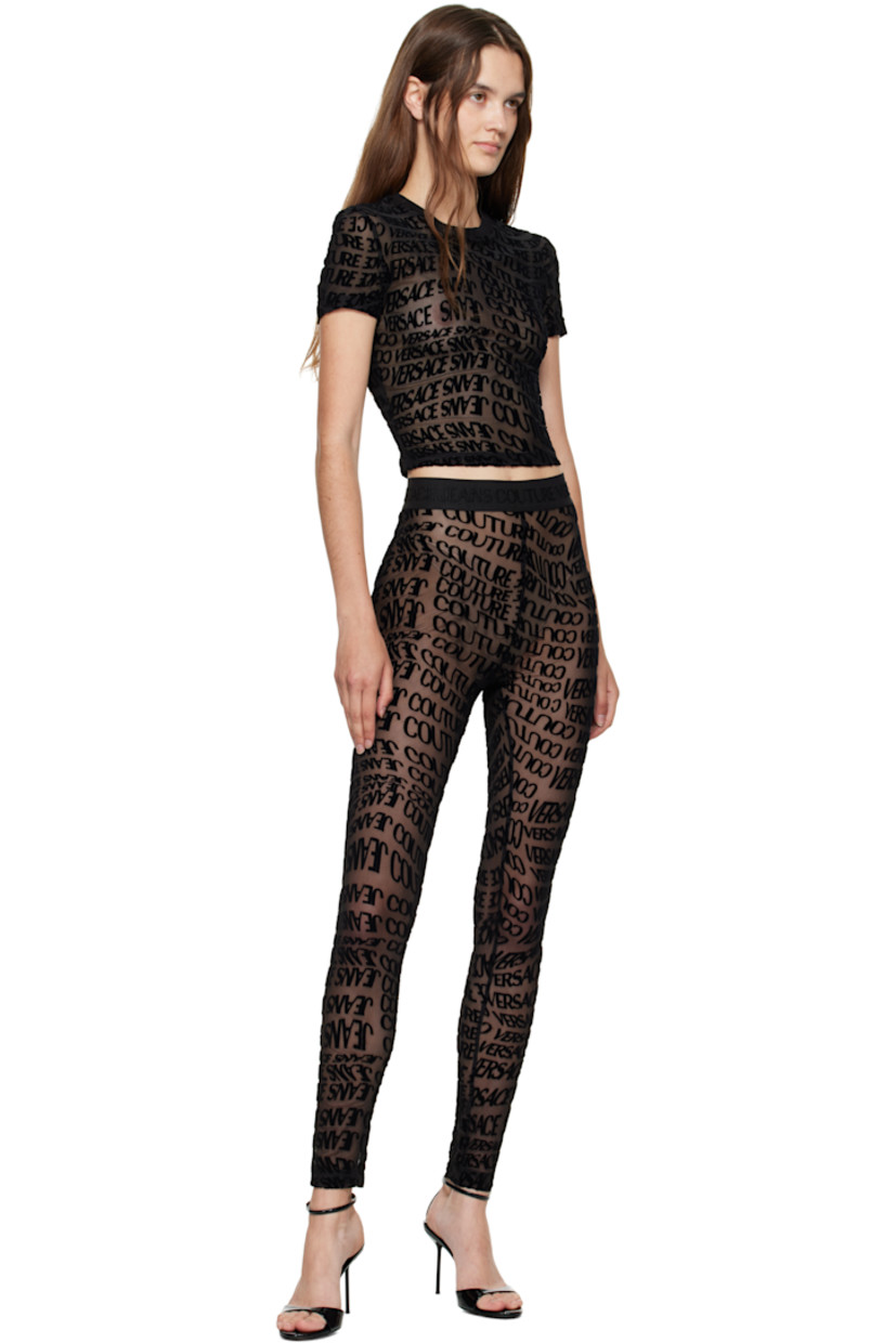 Sheer stretch mesh T-shirt.

· Logo pattern flocked throughout
· Rib-knit crewneck
· Cropped hem

Supplier color: Black