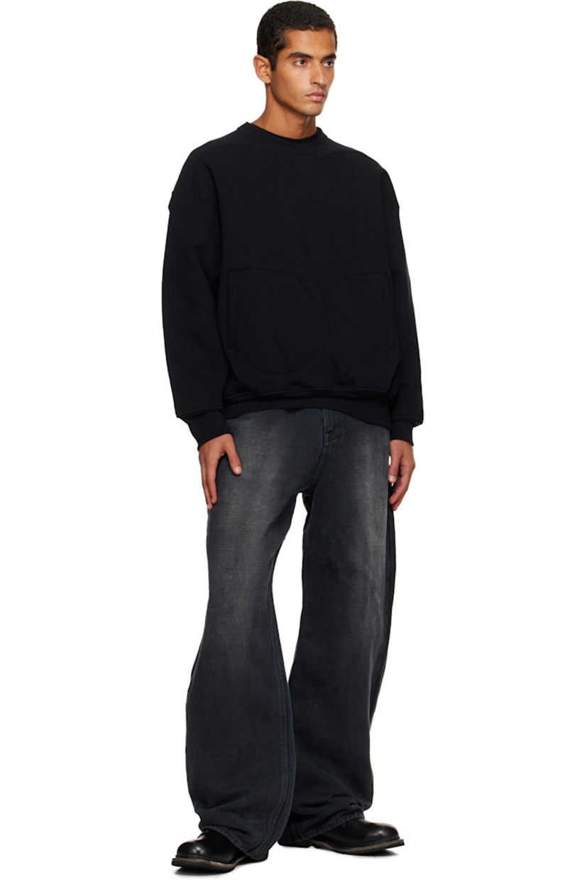 Non-stretch cotton- and jute-blend selvedge denim jeans. 

· Fading throughout 
· Belt loops
· Four-pocket styling
· Zip fly 
· Grained leather appliqués at back waistband

Supplier color: Faded black