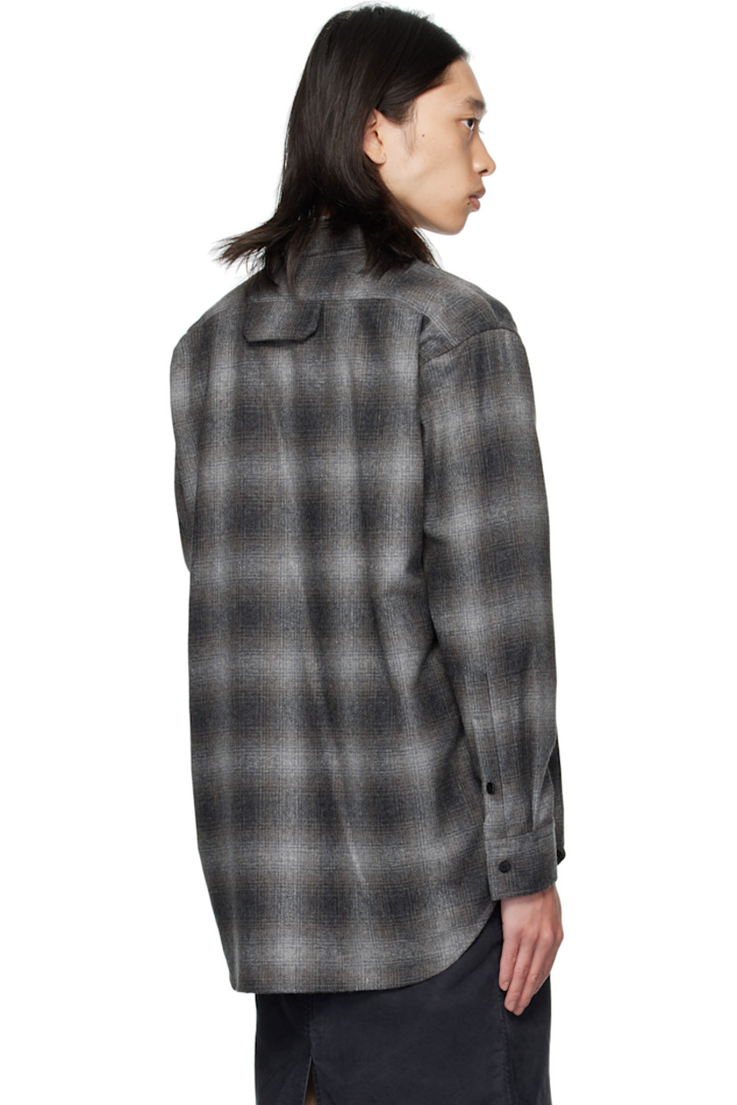 Wool-blend flannel shirt.

· Check pattern throughout
· Spread collar
· Button closure
· Welt pocket at chest
· Shirttail hem
· Buttoned barrel cuffs
· Flap pocket and pleats at back yoke

Supplier color: Black