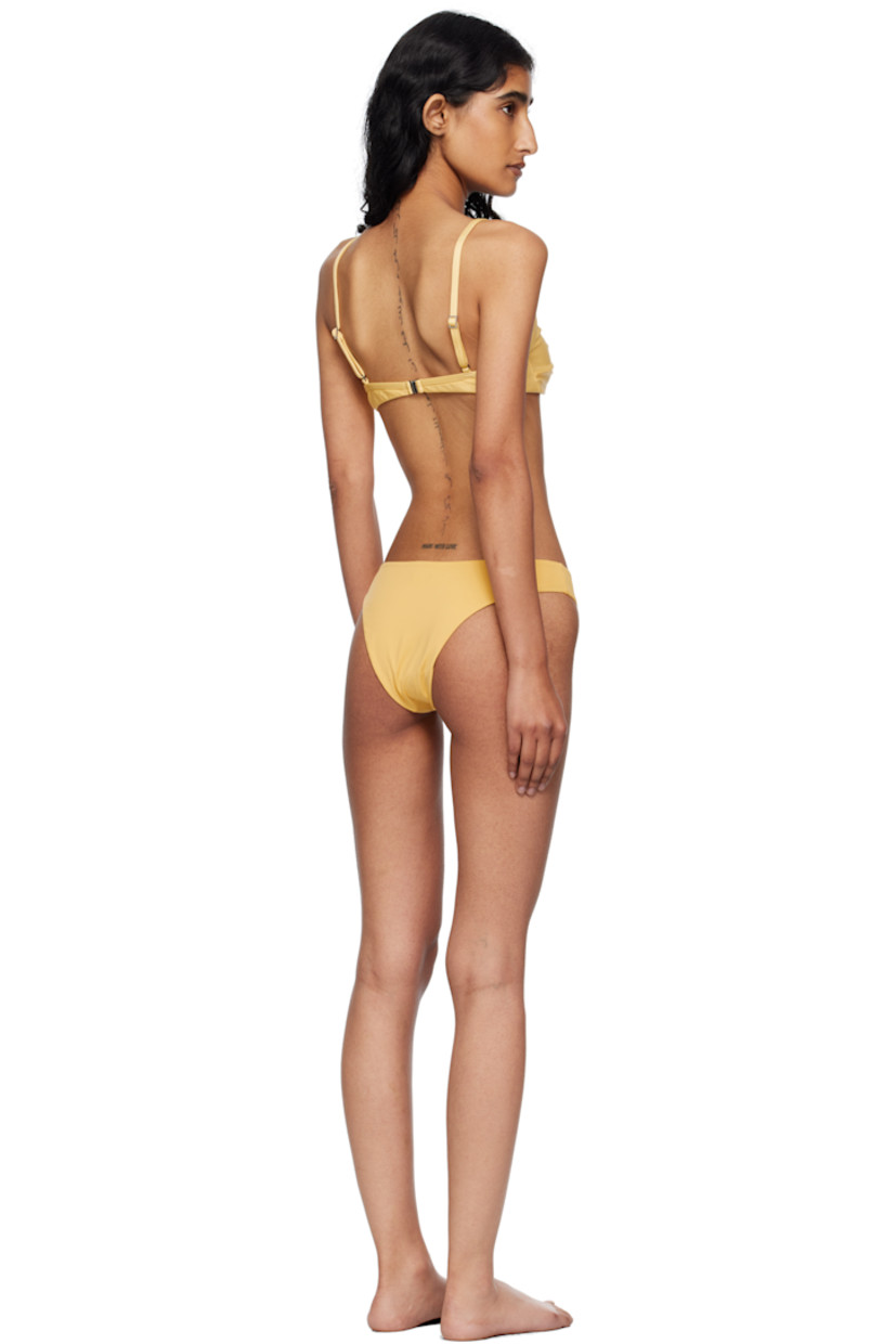 Stretch nylon jersey bikini top and bottom.

· OEKO-TEX®-certified
· UPF 50+ protection
· Sweetheart neck
· Adjustable spaghetti straps
· Hook-eye fastening at back
· Fully lined

Supplier color: Beam yellow
