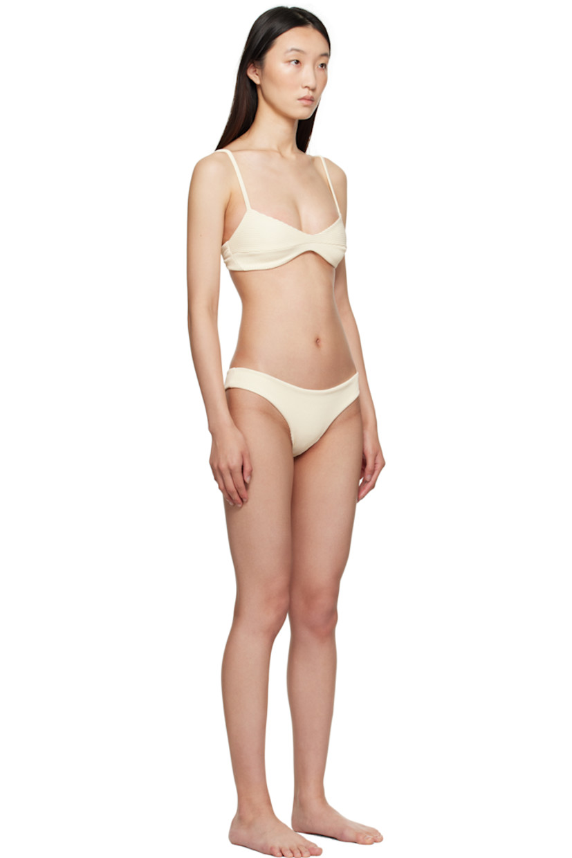 Stretch nylon jersey bikini top and bottom.

· UPF 50+ protection
· Sweetheart neck
· Adjustable spaghetti straps
· Cinch strap at back
· Fully lined

Supplier color: White clay
