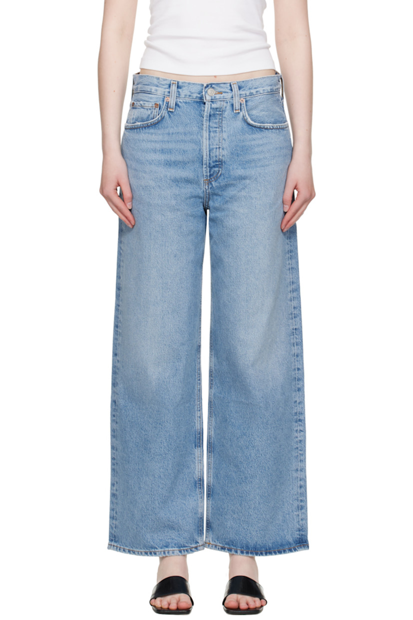 Non-stretch regenerative cotton- and recycled lyocell-blend denim jeans. Fading, whiskering, and subtle distressing throughout.

· Straight-leg and relaxed-fit
· Low-rise
· Belt loops
· Five-pocket styling
· Button fly
· Logo-engraved silver- and copper-tone hardware
· Contrast stitching in tan

Supplier color: Libertine