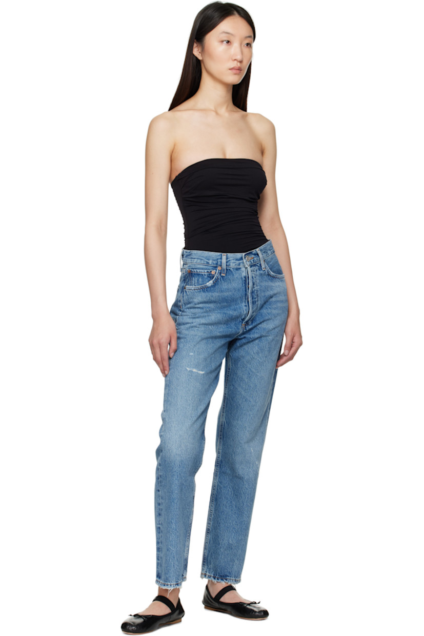 Non-stretch regenerative cotton denim jeans. Fading, whiskering, and distressing throughout.

· Loose-fit, straight-leg
· Mid-rise
· Belt loops
· Five-pocket styling
· Button fly
· Logo-engraved silver-tone hardware
· Contrast stitching in tan

Supplier color: Shrine