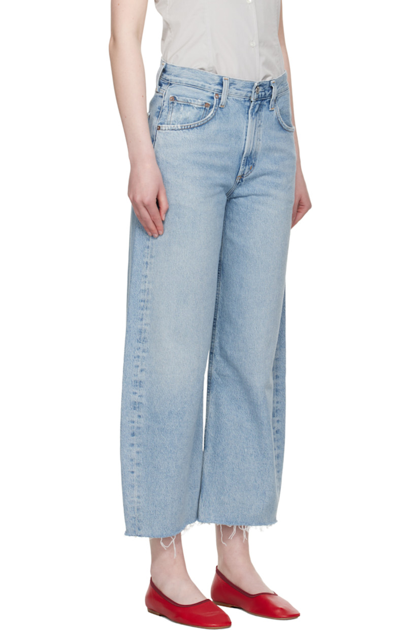 Non-stretch regenerative cotton denim jeans. Fading, whiskering, and subtle distressing throughout.

· Low-rise
· Belt loops
· Five-pocket styling
· Zip fly
· Raw edge at hem
· Logo-engraved silver- and copper-tone hardware
· Contrast stitching in tan

Supplier color: Force
