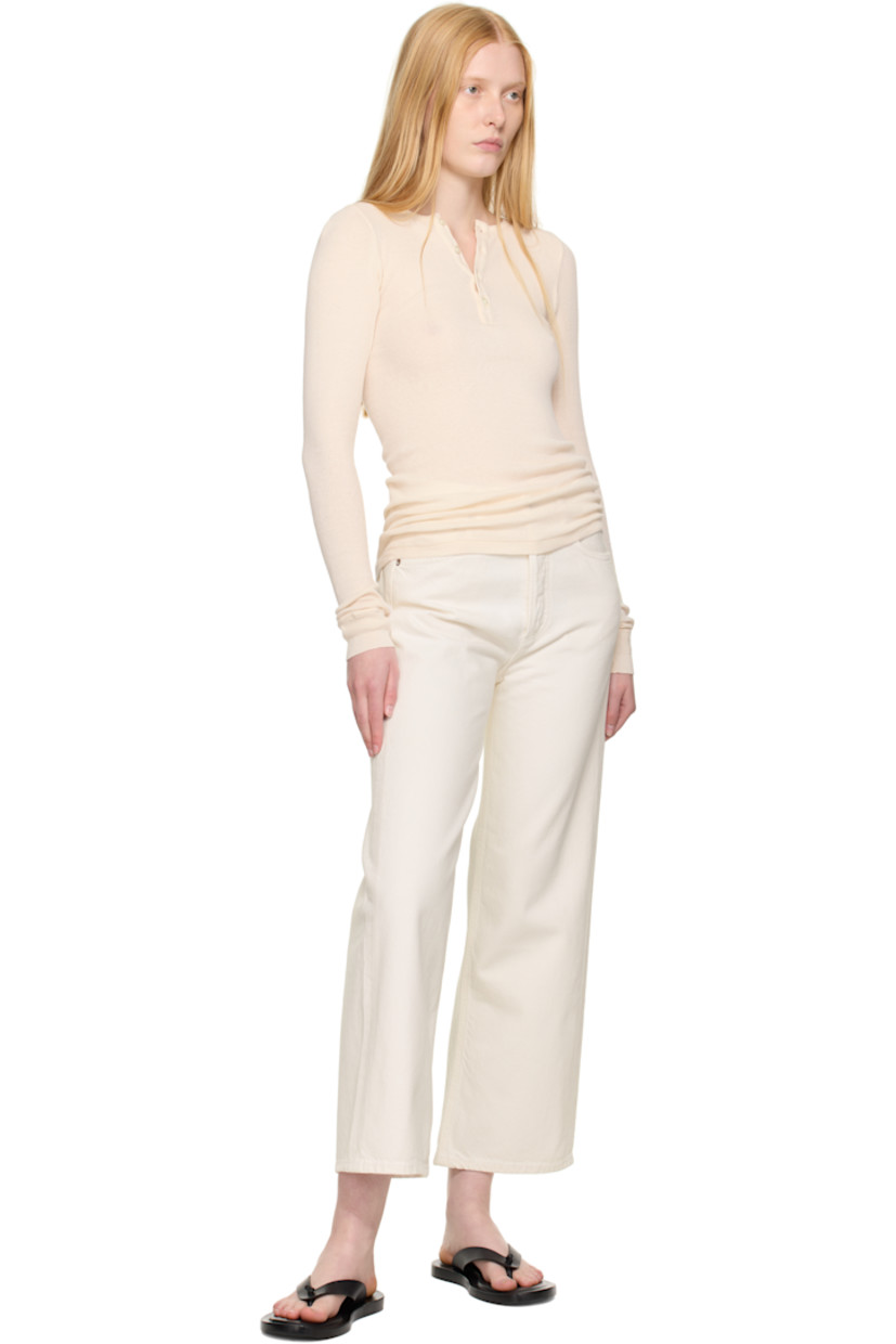 Non-stretch regenerative cotton denim jeans. 

· The Integrity Grown™-certified 
· Wide-leg
· High-rise 
· Belt loops
· Five-pocket styling
· Button fly 
· Cropped leg
· Logo-engraved silver- and bronze-tone hardware

Supplier color: Fortune cookie