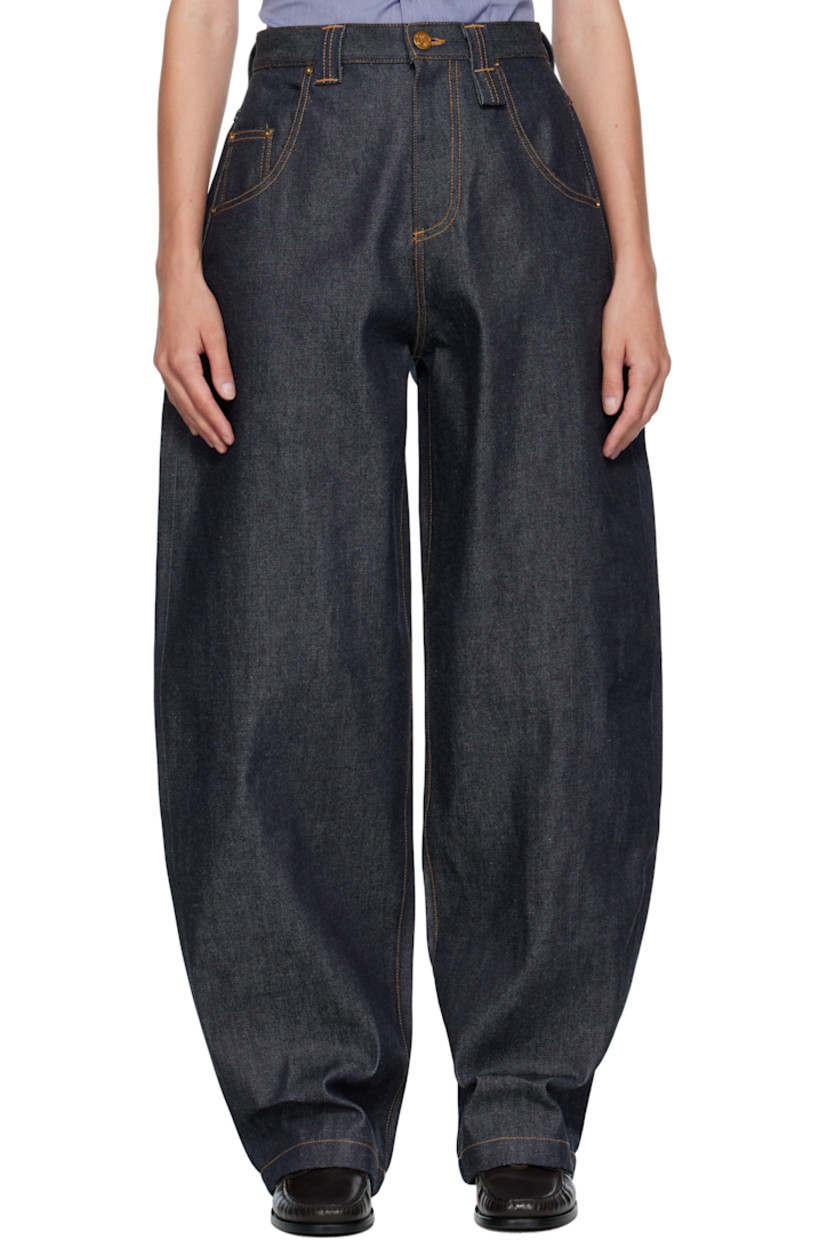 Tapered non-stretch denim jeans.

· High-rise
· Belt loops
· Five-pocket styling
· Zip fly
· Leather logo patch at back waistband
· Logo patch at back pocket
· Logo-engraved antiqued gold-tone hardware
· Contrast stitching in tan

Supplier color: Blue denim