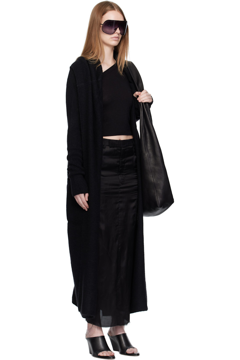 Knit and rib-knit stretch alpaca-blend cardigan. 

· Shawl collar
· Open front
· Dropped shoulders
· Central garter-stitched stripe at back

Supplier color: Black