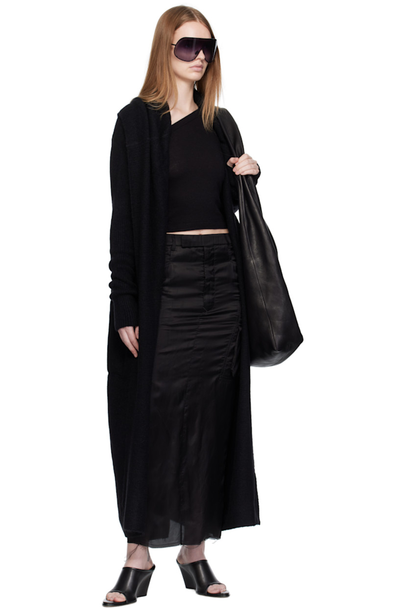 Knit and rib-knit stretch alpaca-blend cardigan. 

· Shawl collar
· Open front
· Dropped shoulders
· Central garter-stitched stripe at back

Supplier color: Black