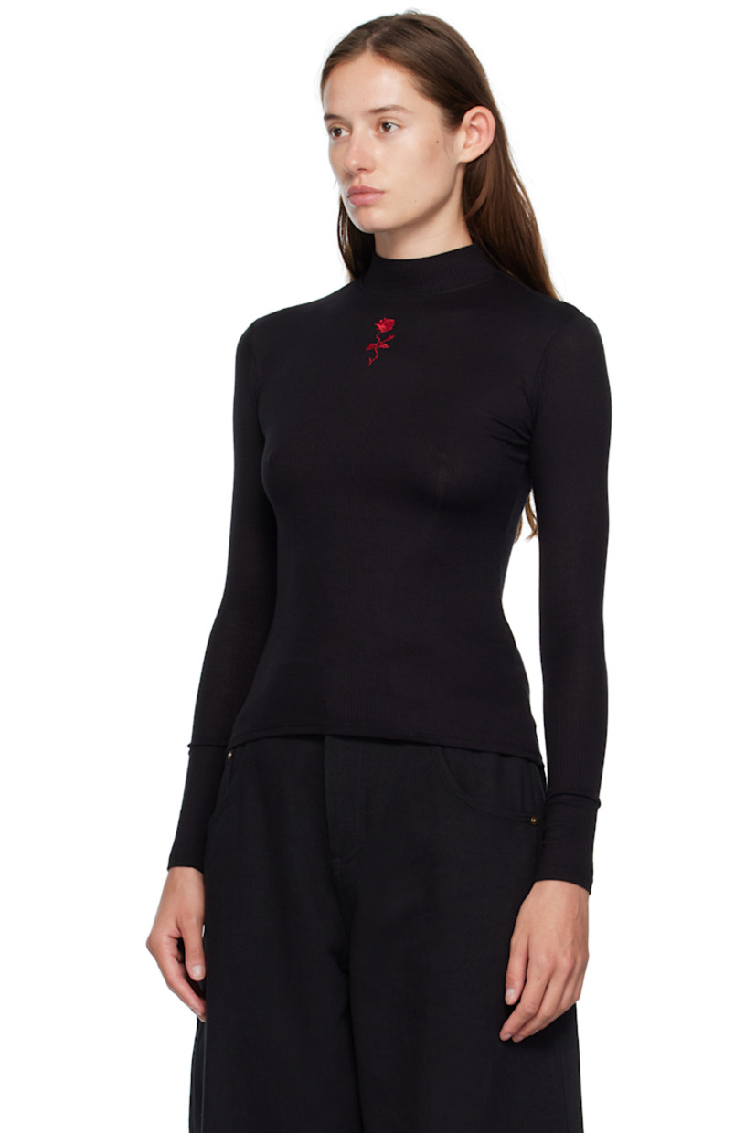Stretch ribbed jersey top.

· Mock neck
· Graphic embroidered at chest

Supplier color: Black