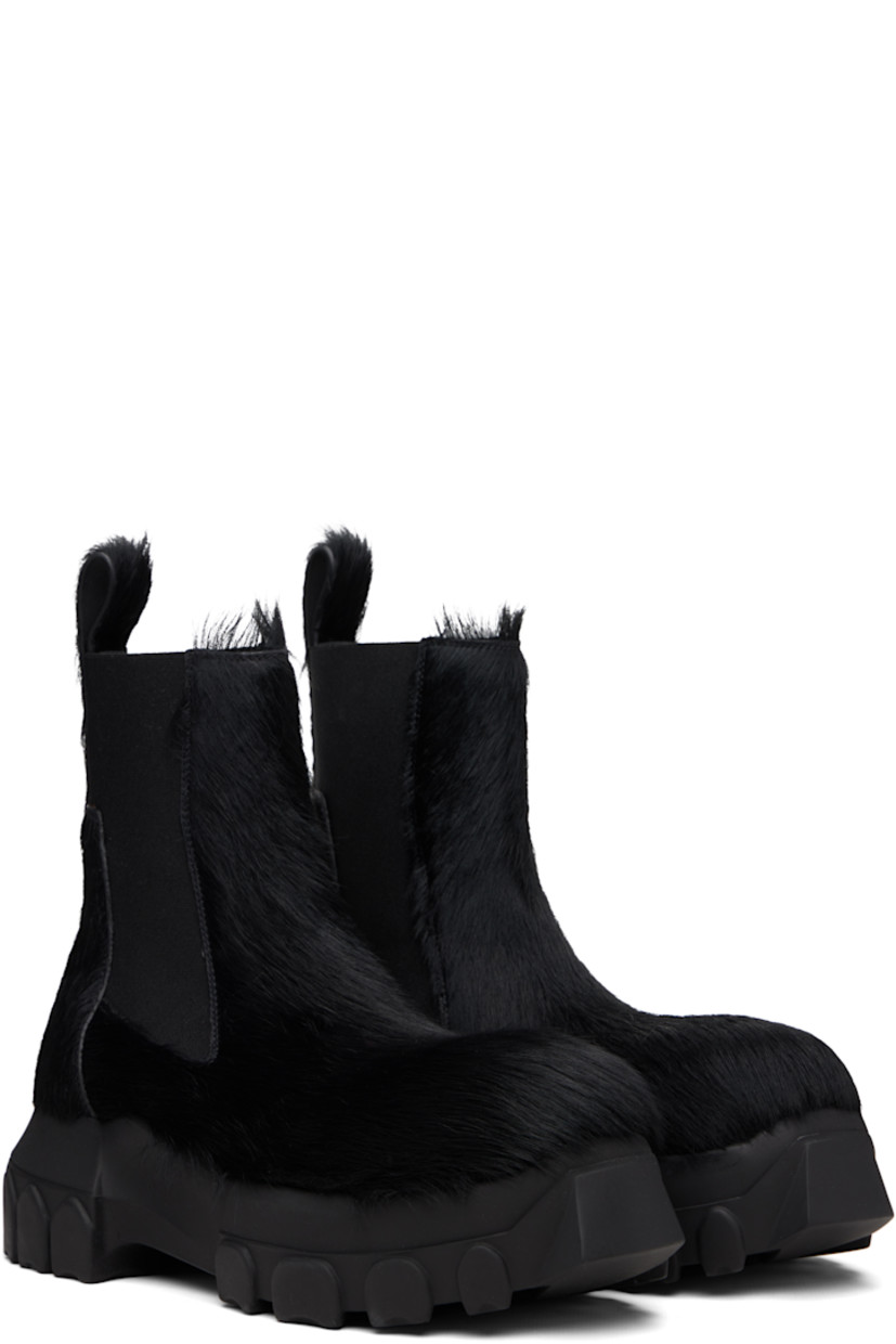 Ankle-high hair-on-leather Chelsea boots.

· Elasticized gusset at sides
· Pull-loop at heel collar
· Buffed leather lining
· Treaded rubber platform sole
· Platform: H2"

Supplier color: Black/Black