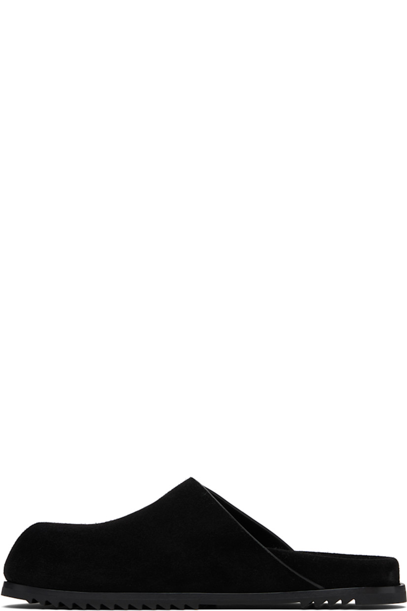 Suede slip-on loafers.

· Logo embossed at molded footbed
· Treaded rubber sole

Supplier color: Black