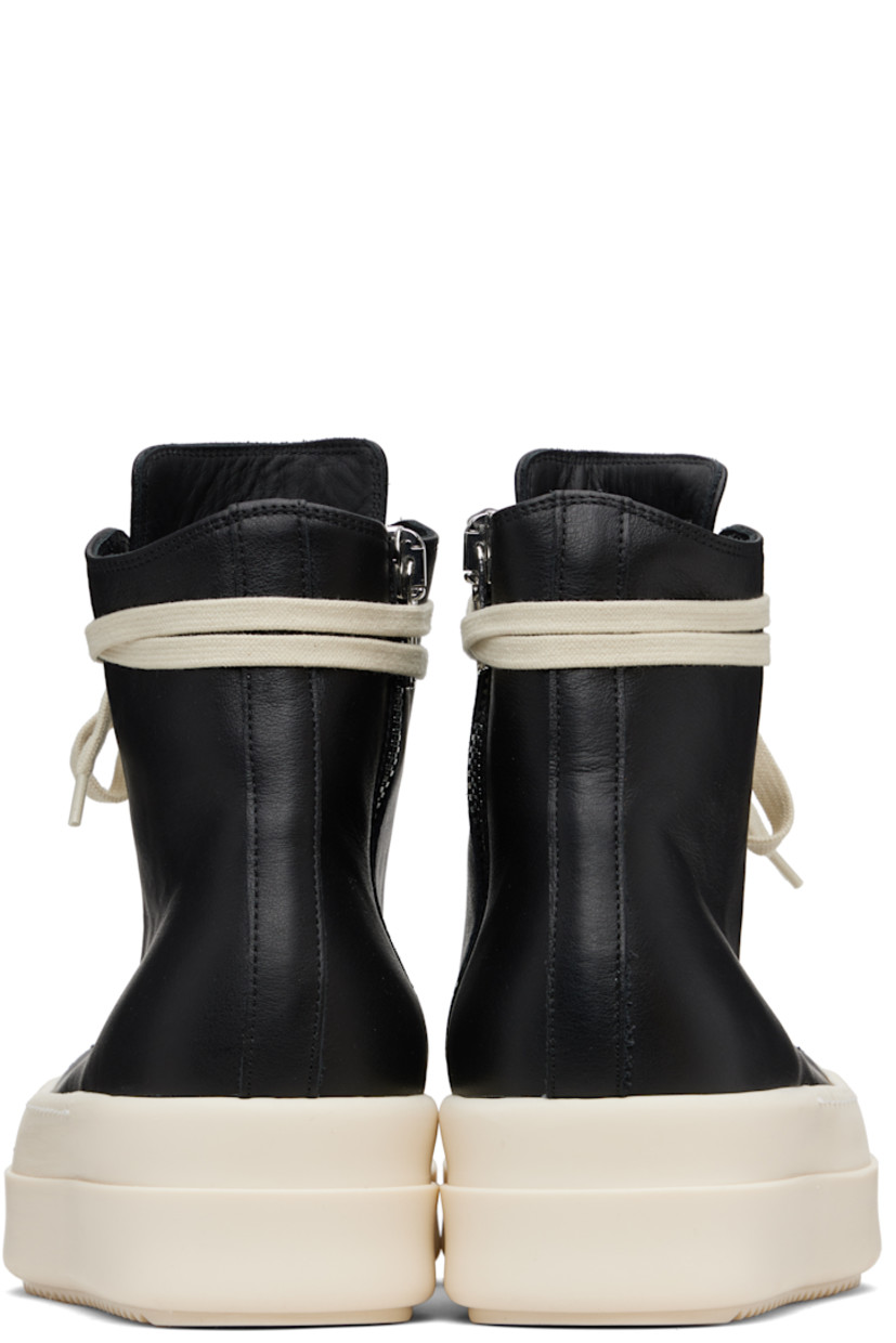 High-top buffed leather sneakers.

· LWG-certified leather
· Calfskin cap toe
· Lace-up closure
· Zip closure and metal eyelets at inner side
· Treaded rubber platform sole
· Platform: H2"

Supplier color: Black/Milk/Milk