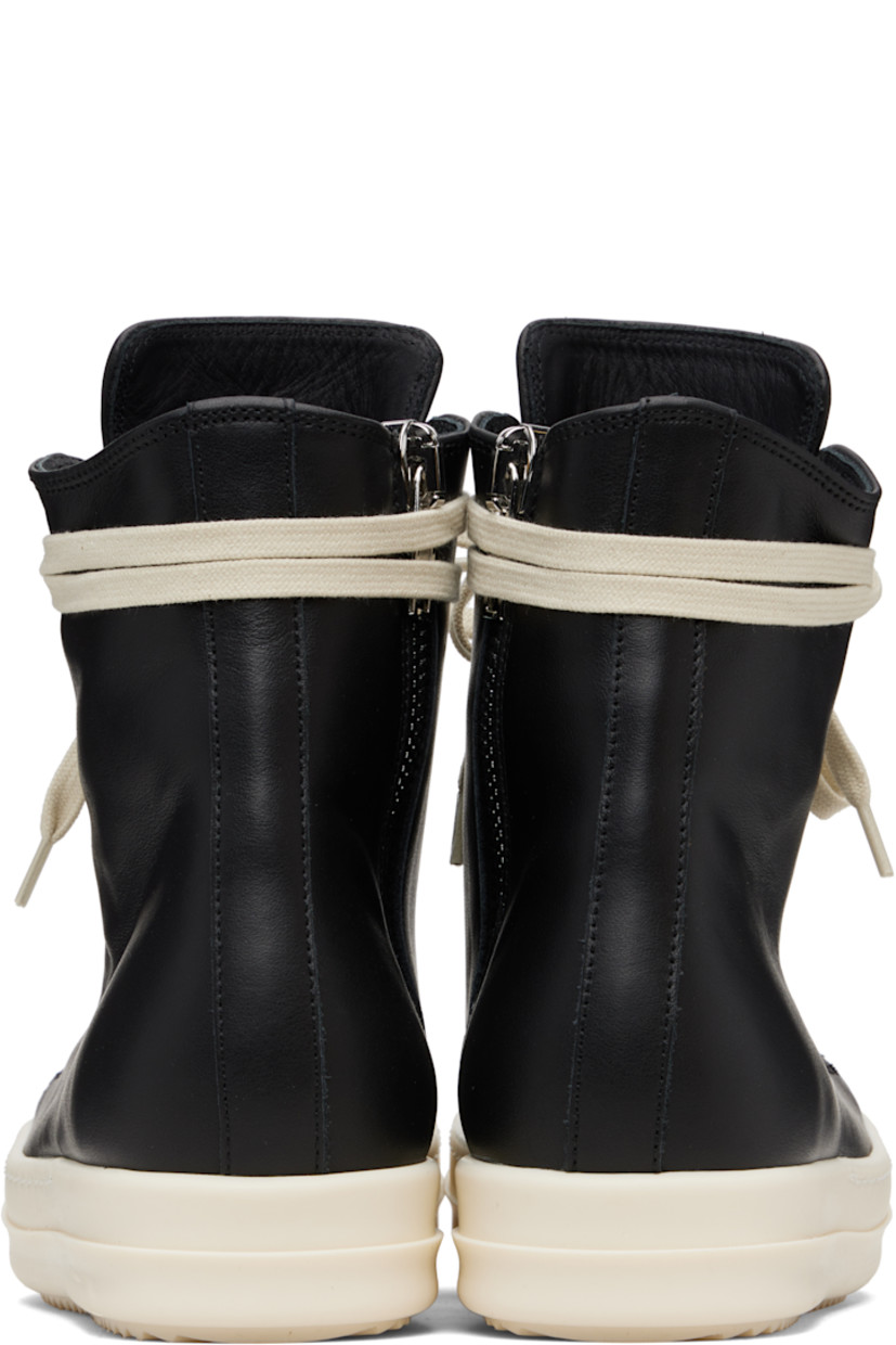High-top buffed leather sneakers.

· LWG-certified leather
· Calfskin cap toe
· Lace-up closure
· Zip closure and metal eyelets at inner side
· Treaded rubber sole

Supplier color: Black/Milk/Milk