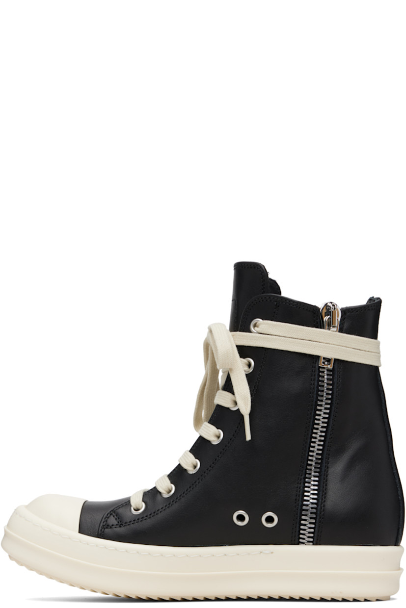 High-top buffed leather sneakers.

· LWG-certified leather
· Calfskin cap toe
· Lace-up closure
· Zip closure and metal eyelets at inner side
· Treaded rubber sole

Supplier color: Black/Milk/Milk