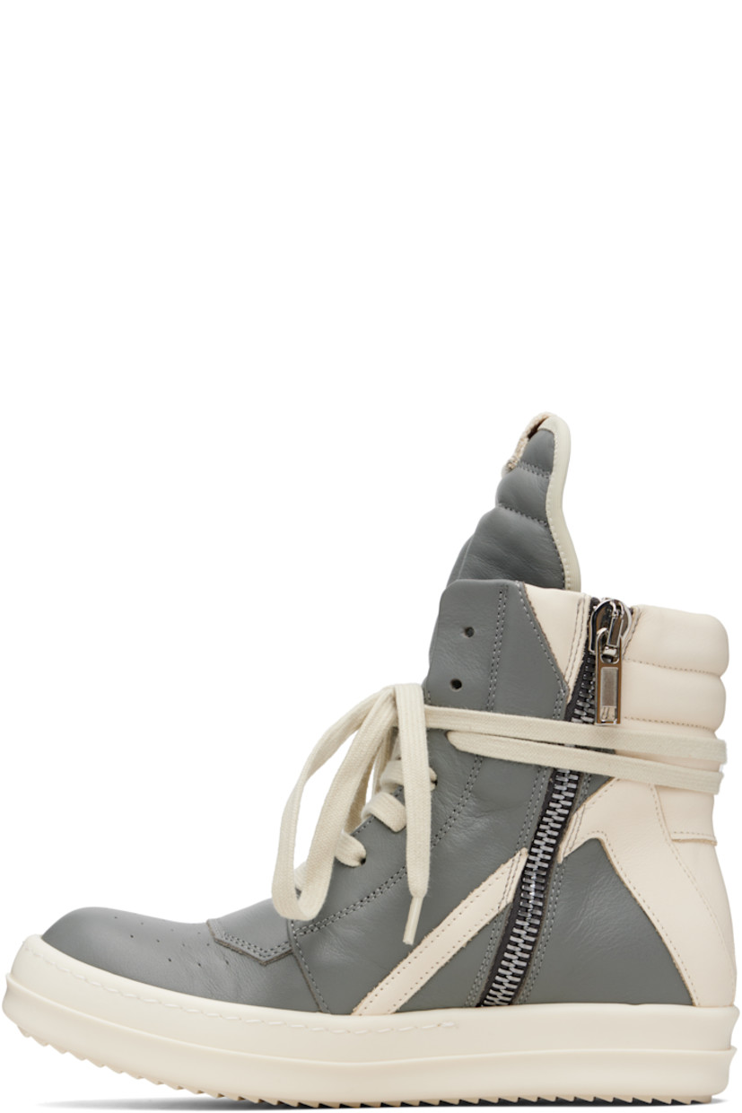 High-top buffed leather sneakers.

· LWG-certified leather
· Perforated detailing at toe
· Lace-up closure
· Padded and quilted collar
· Zip closure at inner side
· Treaded rubber sole

Supplier color: Washed indigo/Milk/Milk