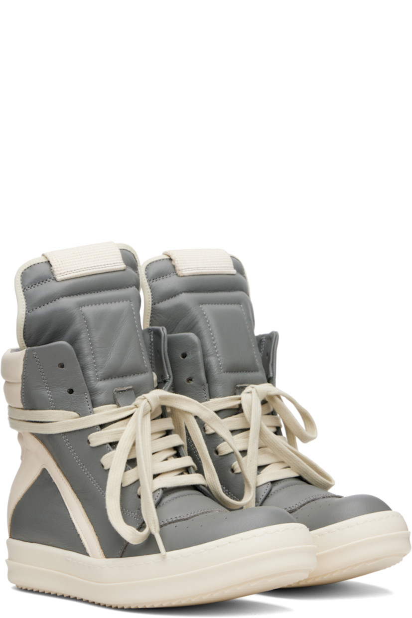 High-top buffed leather sneakers.

· LWG-certified leather
· Perforated detailing at toe
· Lace-up closure
· Padded and quilted collar
· Zip closure at inner side
· Treaded rubber sole

Supplier color: Washed indigo/Milk/Milk