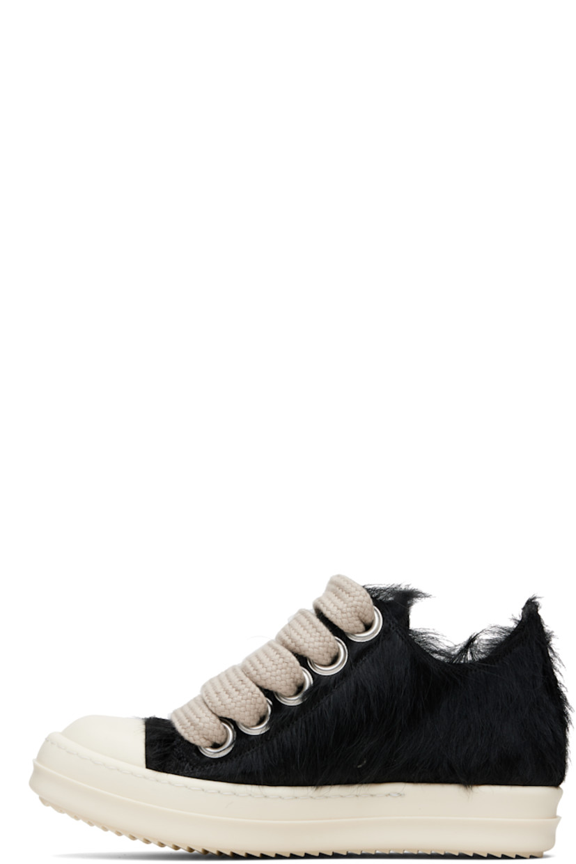 Low-top hair-on-leather sneakers.

· Calfskin cap toe
· Lace-up closure
· Metal eyelets at inner side
· Buffed leather lining
· Treaded rubber sole

Supplier color: Black/Milk/Milk