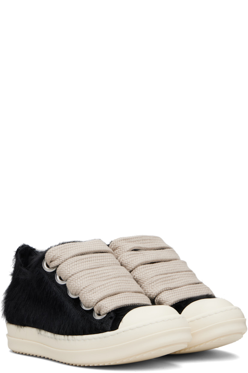 Low-top hair-on-leather sneakers.

· Calfskin cap toe
· Lace-up closure
· Metal eyelets at inner side
· Buffed leather lining
· Treaded rubber sole

Supplier color: Black/Milk/Milk