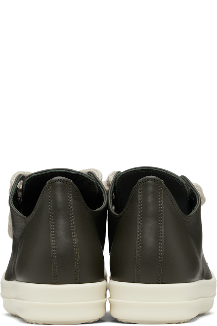 Low-top buffed leather sneakers.

· LWG-certified leather
· Calfskin cap toe
· Lace-up closure
· Metal eyelets at inner side
· Treaded rubber sole

Supplier color: Boaco/Milk/Milk