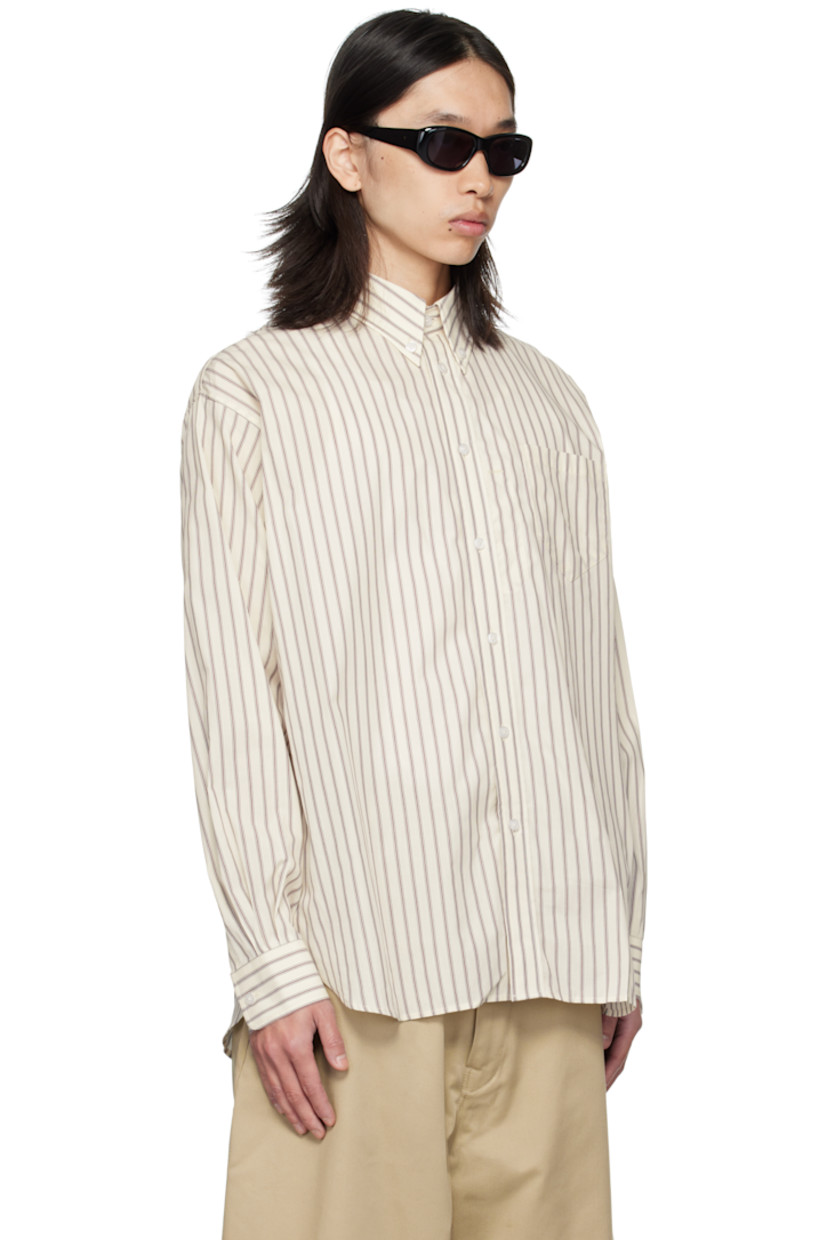 Cotton poplin shirt. 

· Striped throughout 
· Buttoned-down spread collar 
· Button closure
· Patch pocket at chest
· Shirttail hem 
· Pleats at buttoned barrel cuffs
· Logo and inverted box pleat at back yoke 

Supplier color: Bordeau