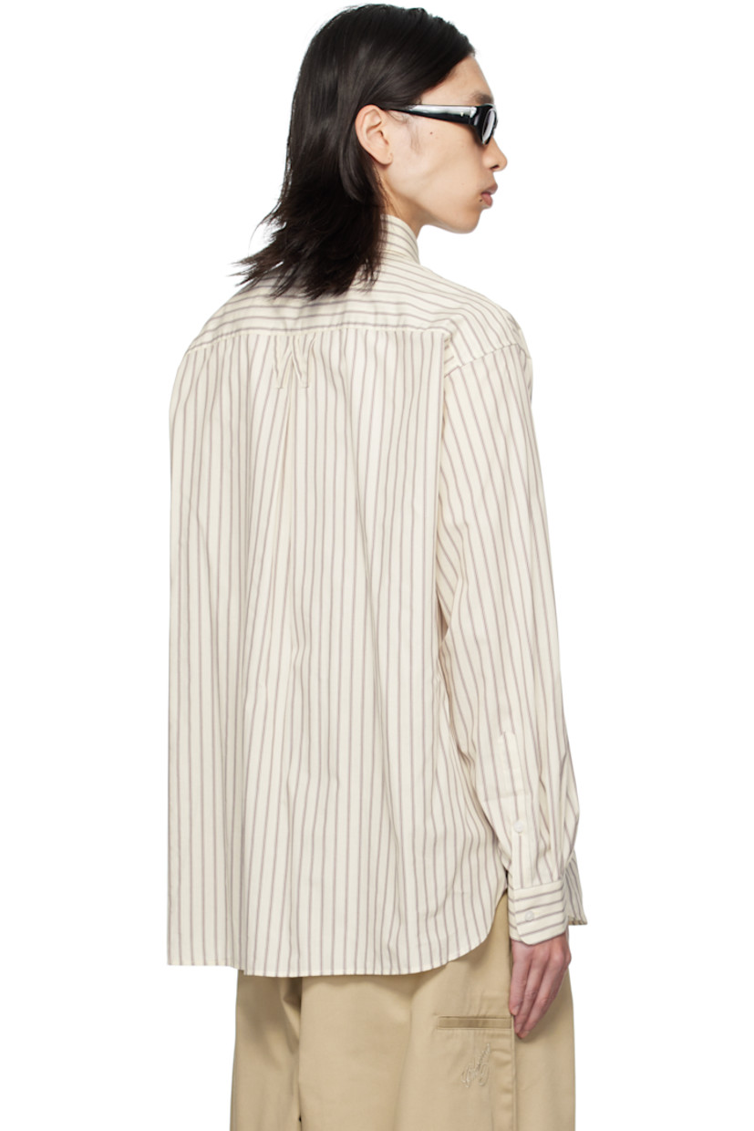 Cotton poplin shirt. 

· Striped throughout 
· Buttoned-down spread collar 
· Button closure
· Patch pocket at chest
· Shirttail hem 
· Pleats at buttoned barrel cuffs
· Logo and inverted box pleat at back yoke 

Supplier color: Bordeau