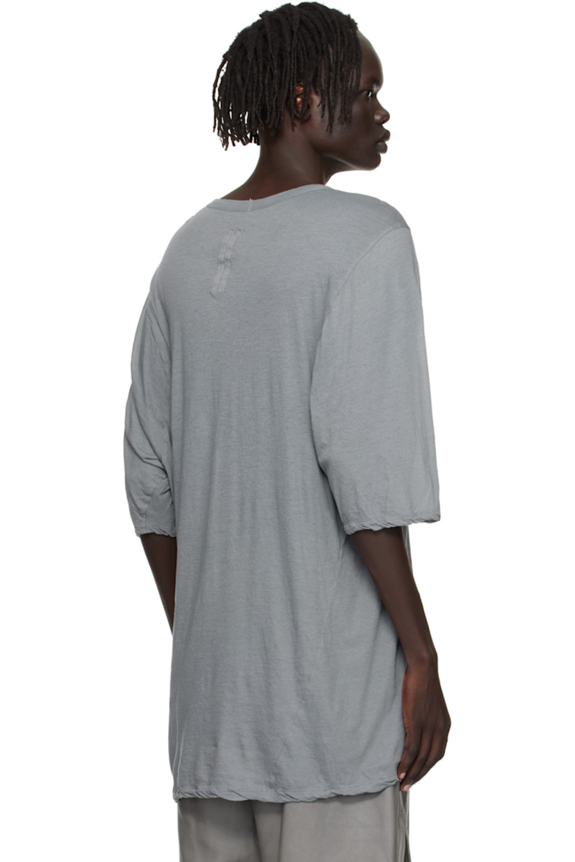 Semi-sheer organic cotton jersey T-shirt.

· Oversized
· GOTS-certified organic cotton
· Rib-knit crewneck
· Twisted side seams
· Offset seam at shoulders

Supplier color: Washed indigo