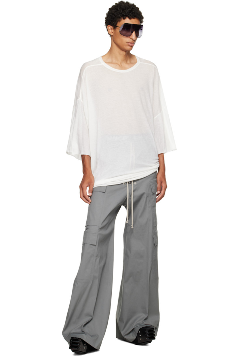 Semi-sheer organic cotton jersey T-shirt.

· GOTS-certified organic cotton
· Rib-knit crewneck
· Raw edge at hem and cuffs
· Twisted side seams
· Offset seam at dropped shoulders

Supplier color: Milk