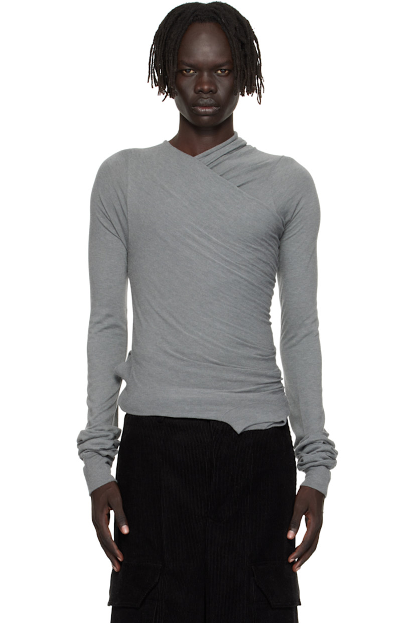Nylon- and viscose-blend jersey T-shirt.

· FSC®- and RWS-certified
· Layered construction
· Draping throughout
· Crisscrossing V-neck
· Rib-knit cutouts at front
· Rib-knit cuffs
· Offset seam at back

Supplier color: Washed indigo