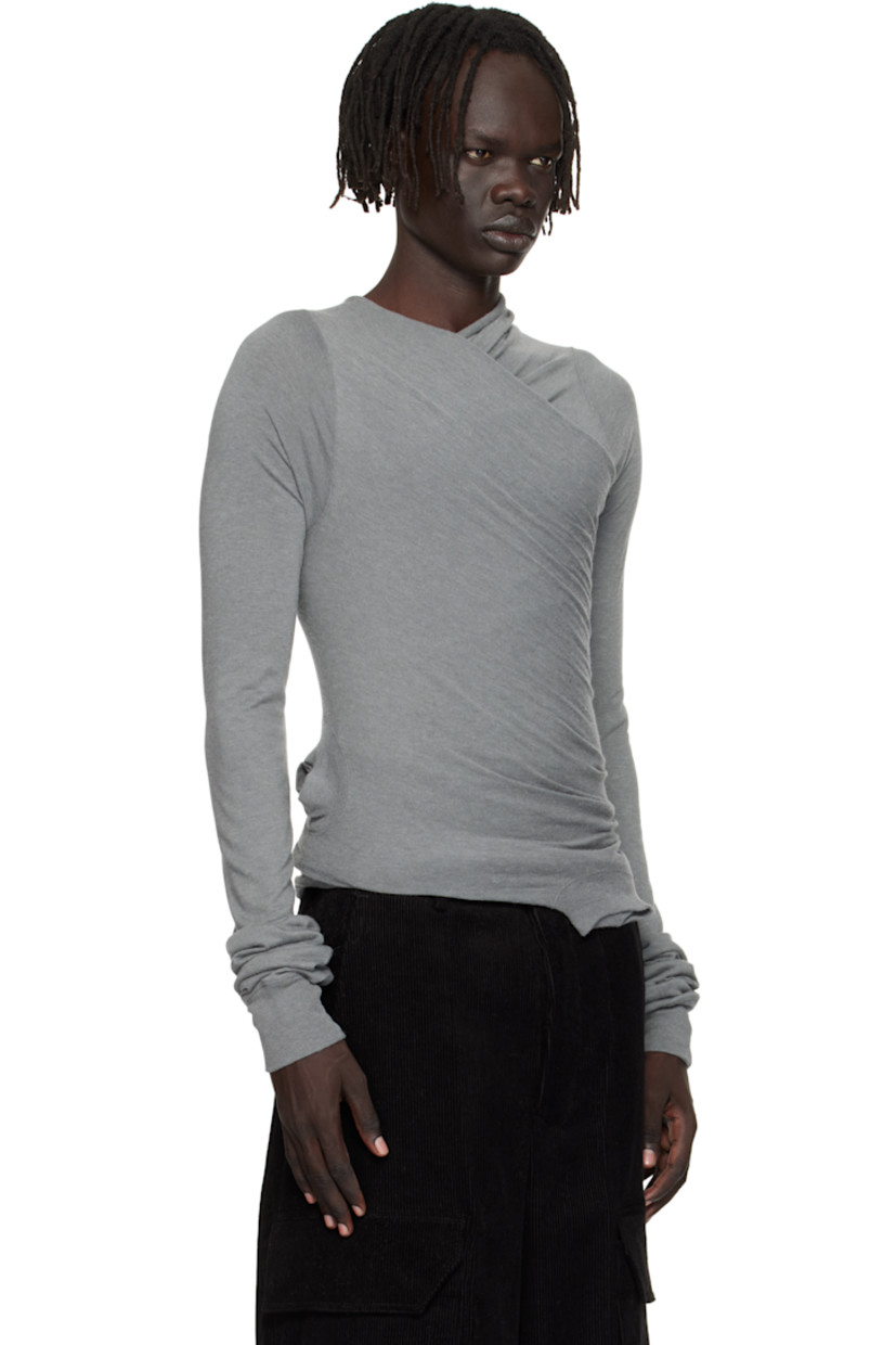 Nylon- and viscose-blend jersey T-shirt.

· FSC®- and RWS-certified
· Layered construction
· Draping throughout
· Crisscrossing V-neck
· Rib-knit cutouts at front
· Rib-knit cuffs
· Offset seam at back

Supplier color: Washed indigo