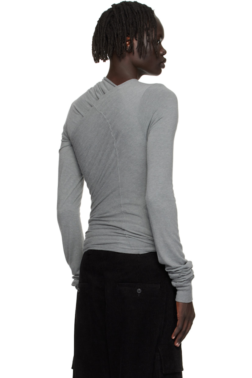 Nylon- and viscose-blend jersey T-shirt.

· FSC®- and RWS-certified
· Layered construction
· Draping throughout
· Crisscrossing V-neck
· Rib-knit cutouts at front
· Rib-knit cuffs
· Offset seam at back

Supplier color: Washed indigo