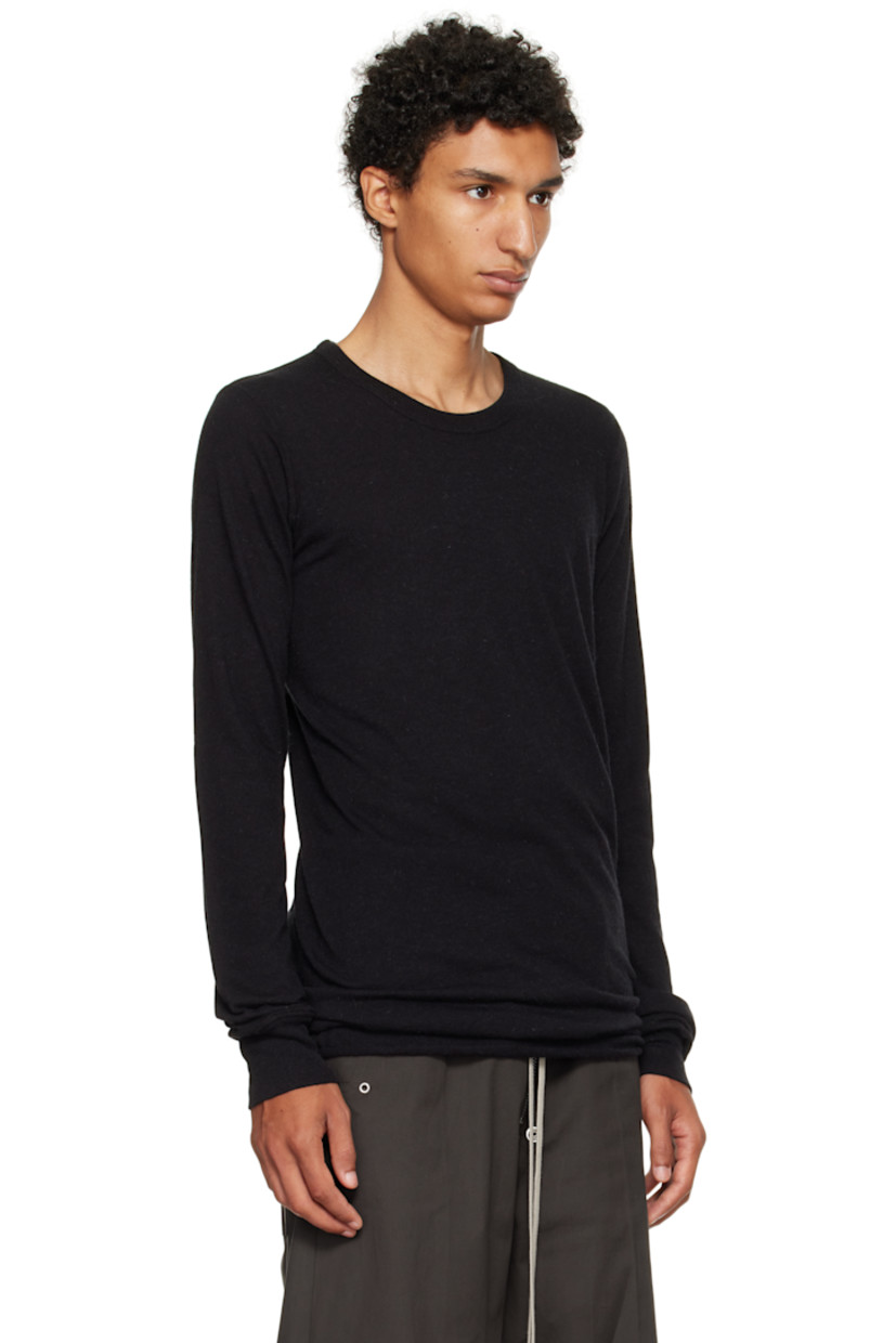 Nylon- and viscose-blend jersey T-shirt.

· FSC®- and RWS-certified
· Rib-knit crewneck and cuffs
· Raw edge at hem 
· Central seam at back

Supplier color: Black