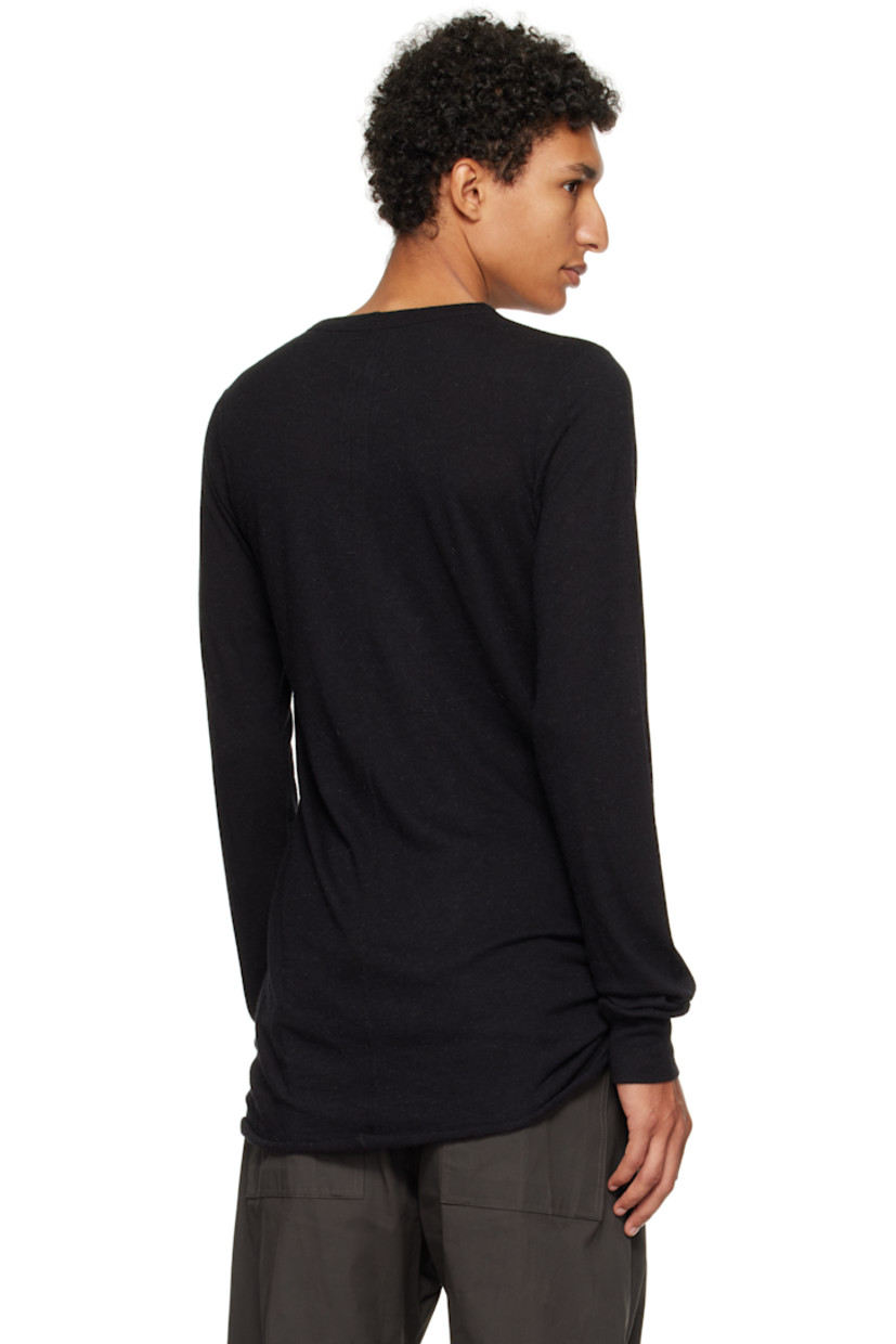 Nylon- and viscose-blend jersey T-shirt.

· FSC®- and RWS-certified
· Rib-knit crewneck and cuffs
· Raw edge at hem 
· Central seam at back

Supplier color: Black