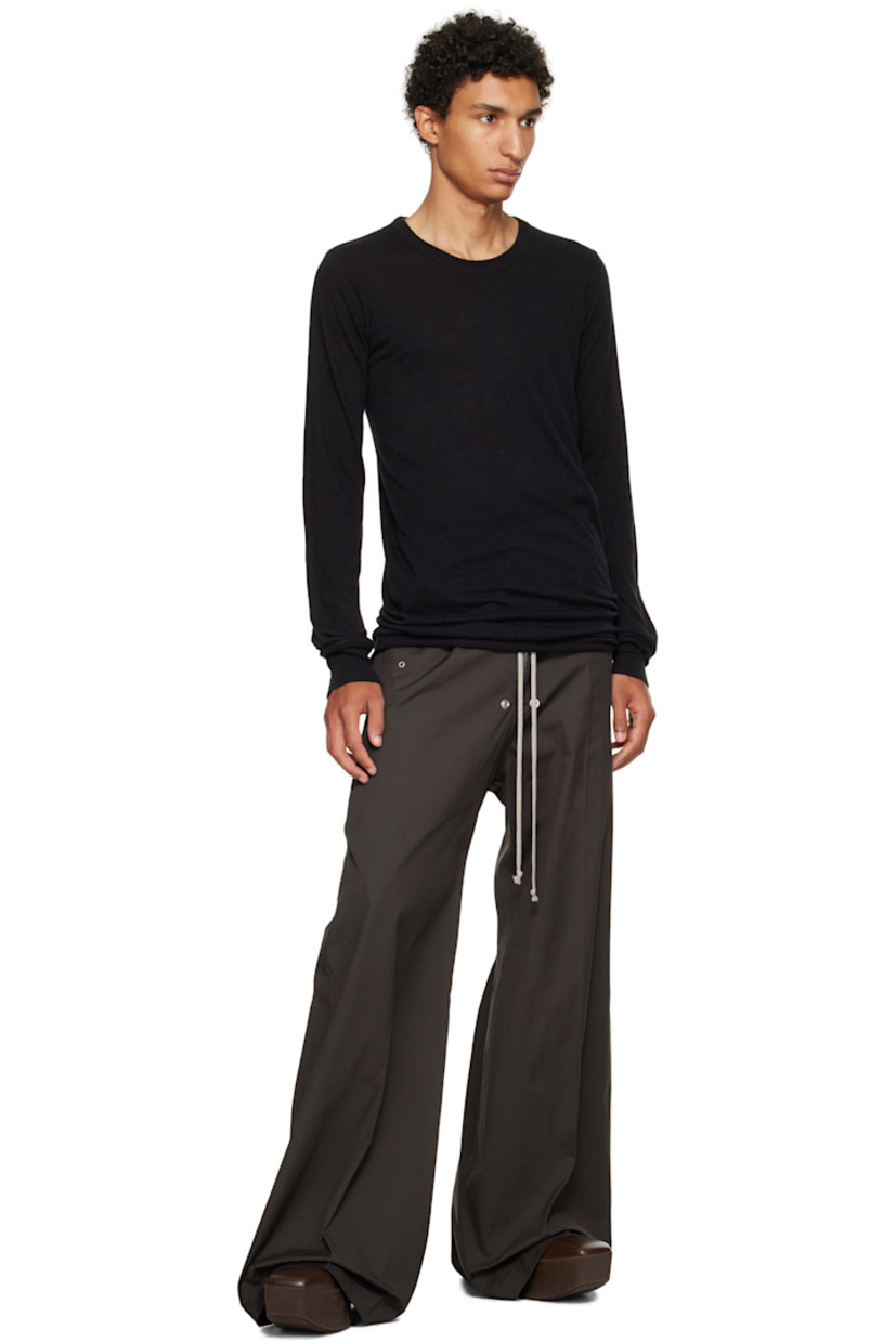 Nylon- and viscose-blend jersey T-shirt.

· FSC®- and RWS-certified
· Rib-knit crewneck and cuffs
· Raw edge at hem 
· Central seam at back

Supplier color: Black