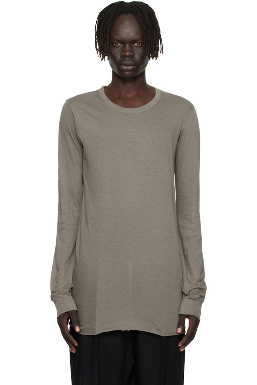 Semi-sheer organic cotton jersey T-shirt.

· GOTS-certified organic cotton
· Rib-knit crewneck and cuffs
· Raw edge at hem
· Twisted seam at side and back

Supplier color: Dust