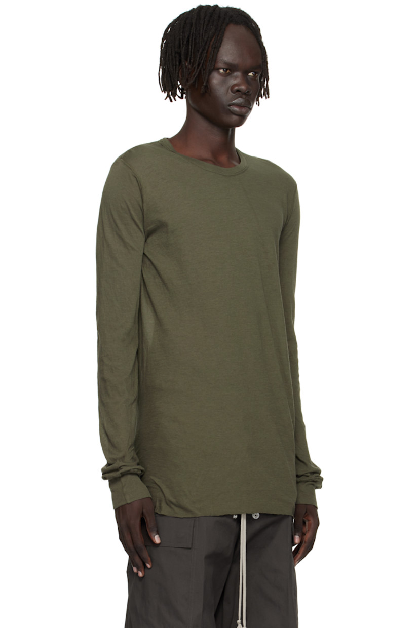 Semi-sheer organic cotton jersey T-shirt.

· GOTS-certified organic cotton
· Rib-knit crewneck and cuffs
· Raw edge at hem
· Twisted seam at side and back

Supplier color: Bosco