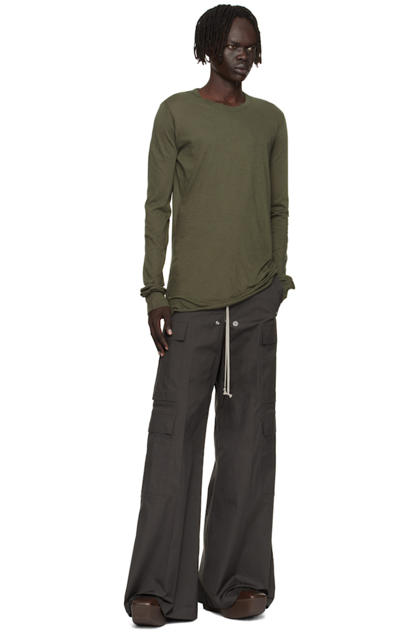 Semi-sheer organic cotton jersey T-shirt.

· GOTS-certified organic cotton
· Rib-knit crewneck and cuffs
· Raw edge at hem
· Twisted seam at side and back

Supplier color: Bosco