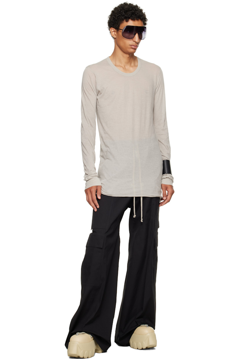 Semi-sheer organic cotton jersey T-shirt.

· GOTS-certified organic cotton
· Rib-knit crewneck and cuffs
· Raw edge at hem
· Twisted seam at side and back

Supplier color: Pearl