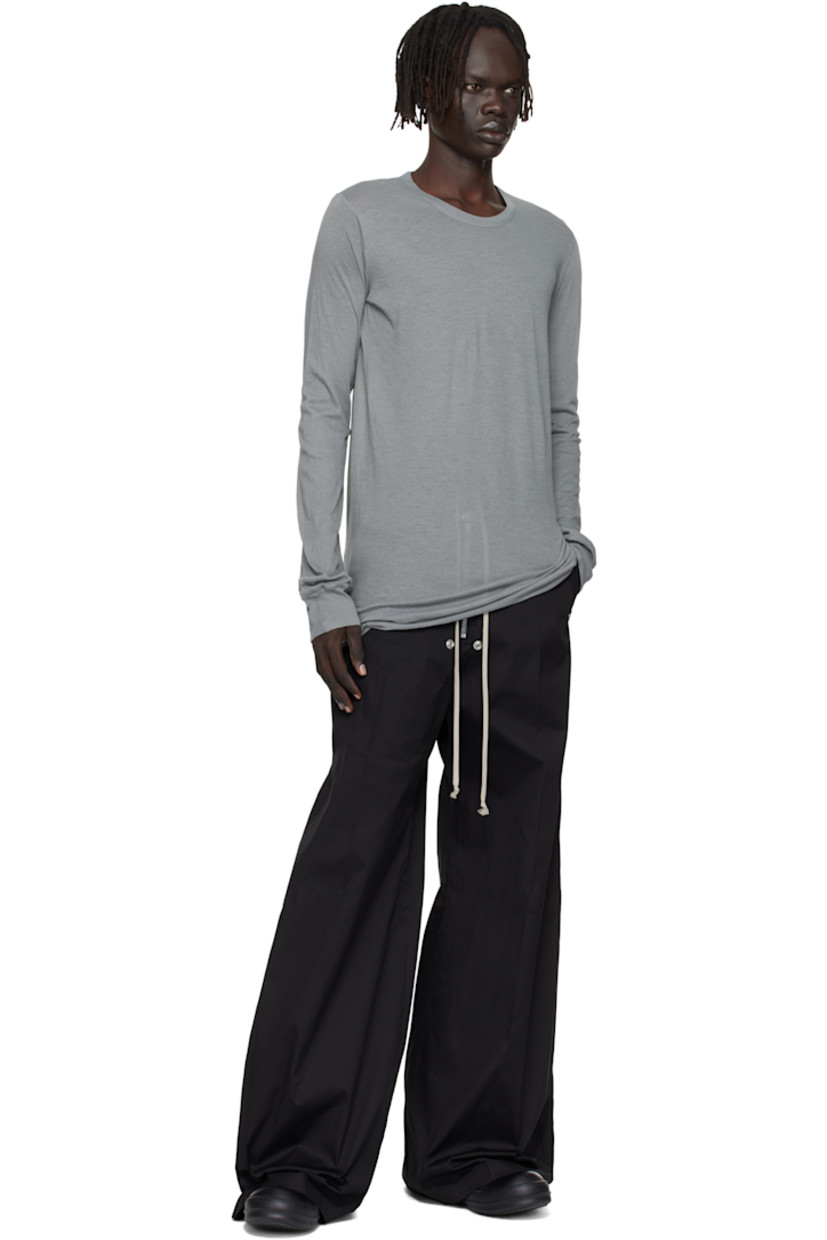 Semi-sheer organic cotton jersey T-shirt.

· GOTS-certified organic cotton
· Rib-knit crewneck and cuffs
· Raw edge at hem
· Twisted seam at side and back

Supplier color: Washed indigo