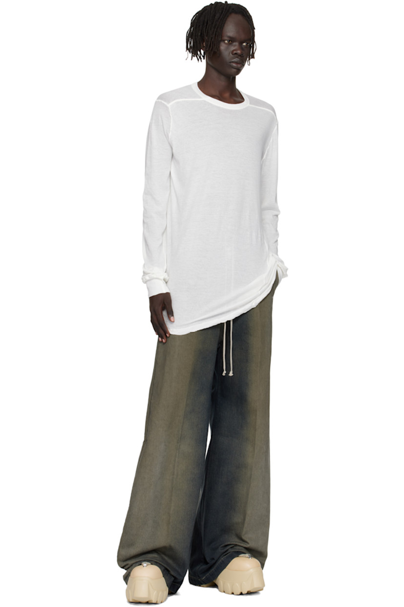 Semi-sheer organic cotton jersey T-shirt.

· GOTS-certified organic cotton
· Rib-knit crewneck and cuffs
· Twisted side seams
· Offset seam at shoulders

Supplier color: Milk
