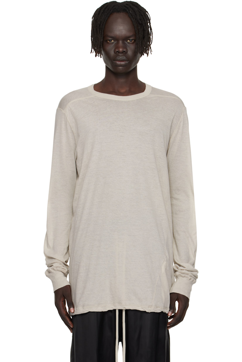 Semi-sheer organic cotton jersey T-shirt.

· GOTS-certified organic cotton
· Rib-knit crewneck and cuffs
· Twisted side seams
· Offset seam at shoulders

Supplier color: Pearl