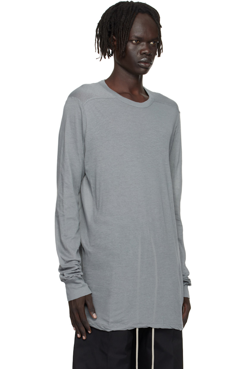 Semi-sheer organic cotton jersey T-shirt.

· GOTS-certified organic cotton
· Rib-knit crewneck and cuffs
· Twisted side seams
· Offset seam at shoulders

Supplier color: Washed indigo