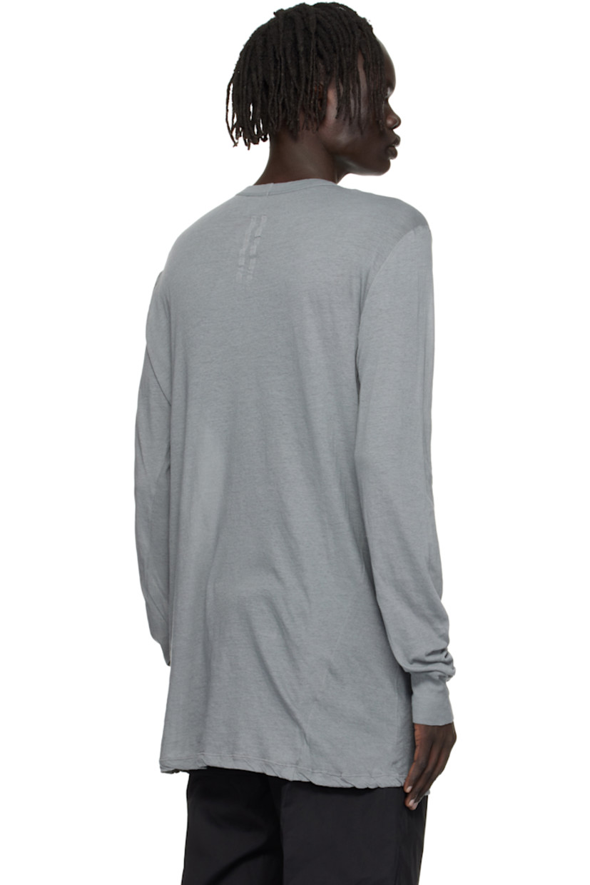 Semi-sheer organic cotton jersey T-shirt.

· GOTS-certified organic cotton
· Rib-knit crewneck and cuffs
· Twisted side seams
· Offset seam at shoulders

Supplier color: Washed indigo
