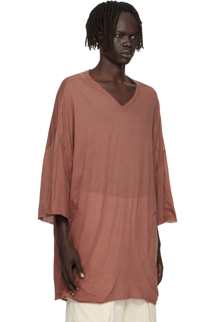 Semi-sheer organic cotton jersey T-shirt.

· GOTS-certified organic cotton
· Rib-knit V-neck
· Raw edge at hem and cuffs
· Twisted side seams
· Offset seam at dropped shoulders

Supplier color: Dark pink