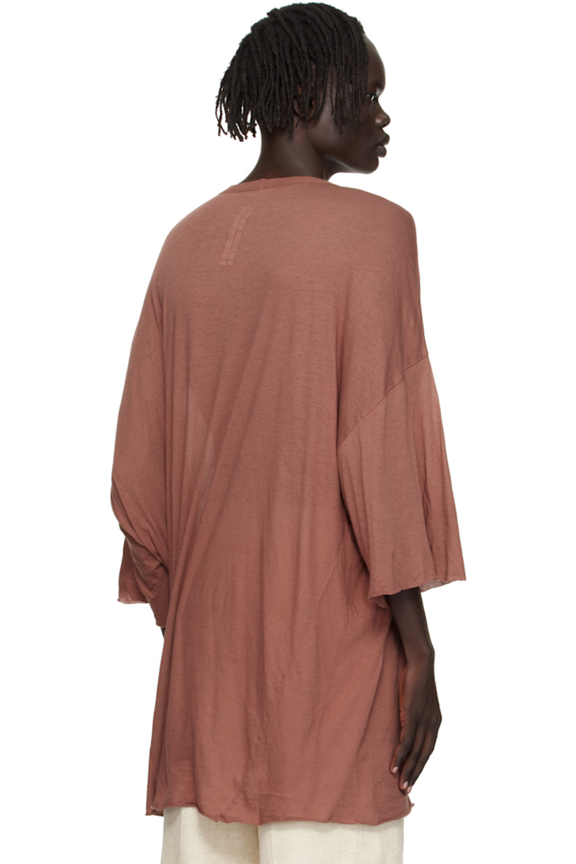 Semi-sheer organic cotton jersey T-shirt.

· GOTS-certified organic cotton
· Rib-knit V-neck
· Raw edge at hem and cuffs
· Twisted side seams
· Offset seam at dropped shoulders

Supplier color: Dark pink