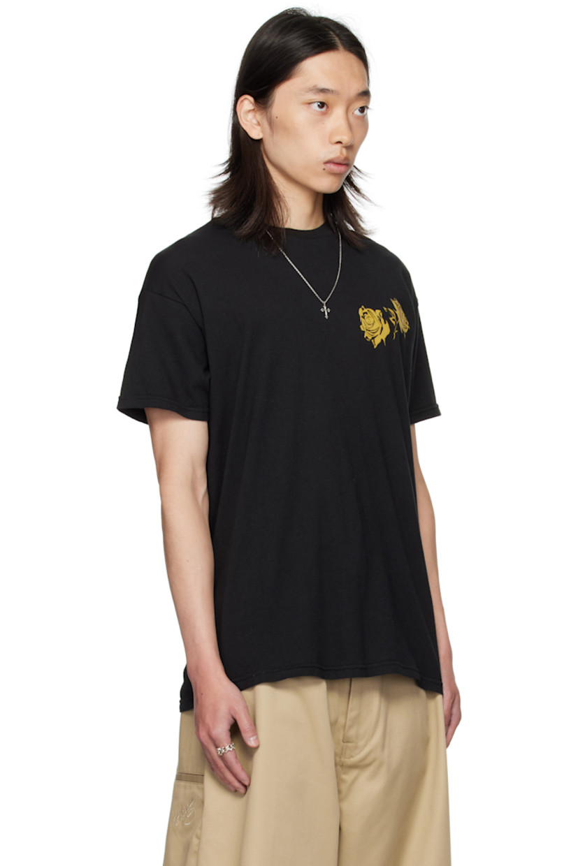 Cotton jersey T-shirt. 

· Rib-knit crewneck
· Graphic printed at chest 
· Text, graphic, and logo printed at back
· Dropped shoulders

Supplier color: Black