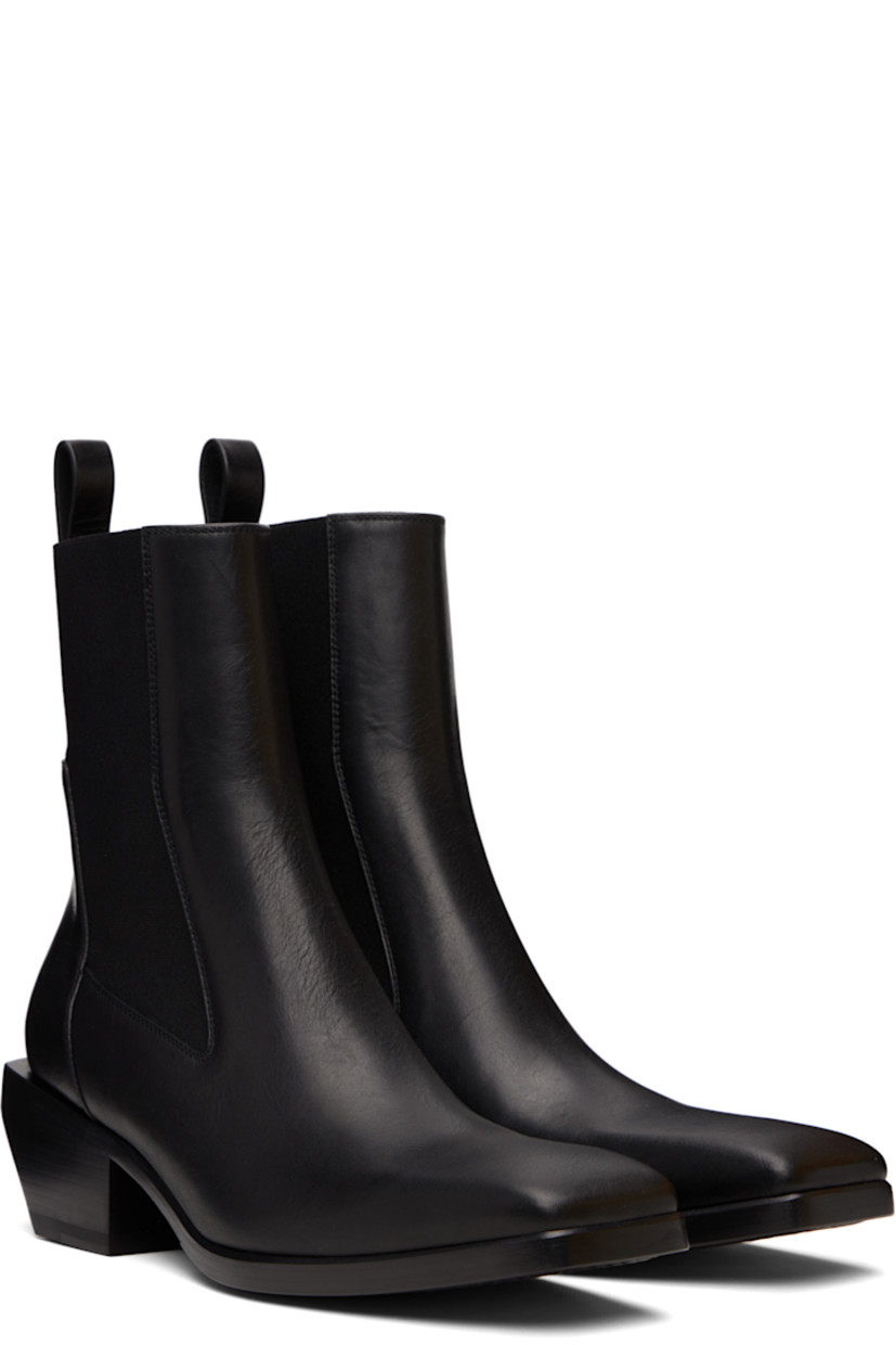 Ankle-high buffed leather Chelsea boots.

· Square toe
· Elasticized gusset at sides
· Pull-loop at heel collar
· Stacked leather heel with rubber injection
· Leather sole
· Heel: H2"

Supplier color: Black/Black