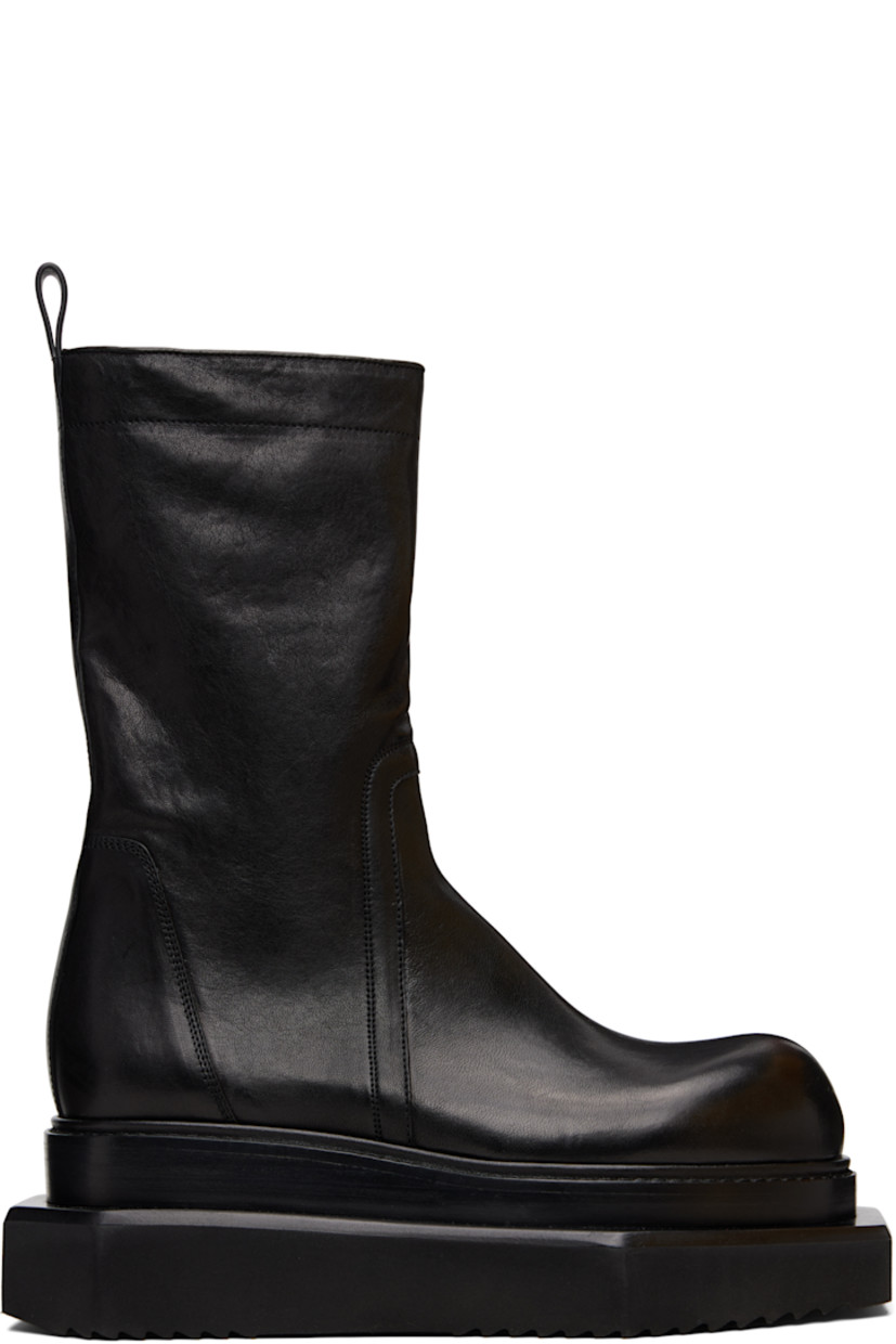 Mid-calf buffed leather boots.

· Zip closure and press-stud tab at inner side
· Pull-loop at heel collar
· Stacked leather and foam rubber platform midsole
· Treaded rubber sole
· Platform: H2.5"

Supplier color: Black