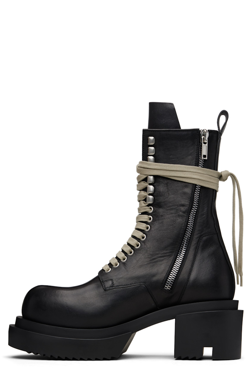 Mid-calf vegetable-tanned buffed calfskin boots. 

· LWG-certified calfskin
· Wraparound lace-up closure
· Zip closure inner side
· Pull-loop at heel collar 
· Rubber block heel and platform midsole 
· Treaded rubber sole 
· Platform: H1.75"
· Heel: H2.5"

Supplier color: Black